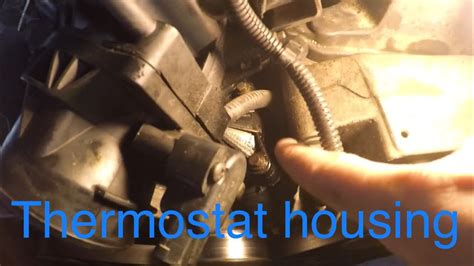 How to Replace Thermostat Housing Assembly 2006